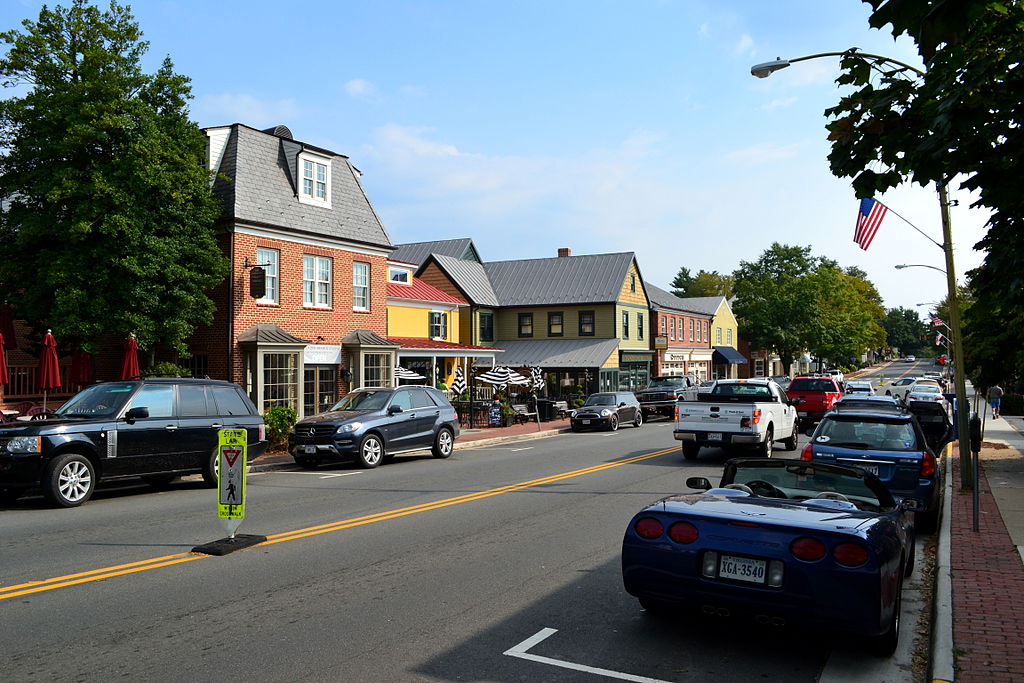 A road lined with cars in the small historic Middleburg town in Virginia.