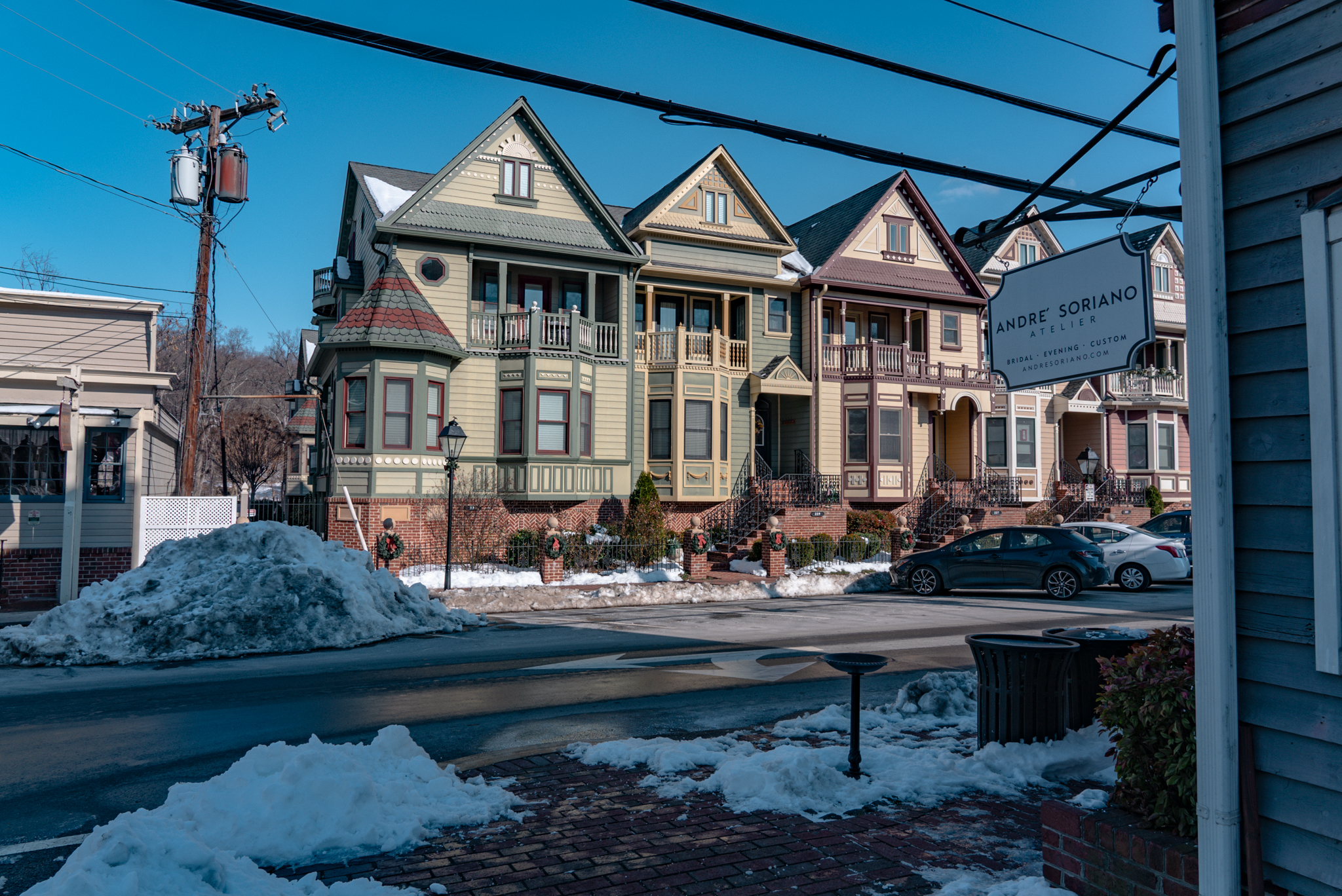 Historic houses in Occoquan, Virginia partly surrounded by snow.