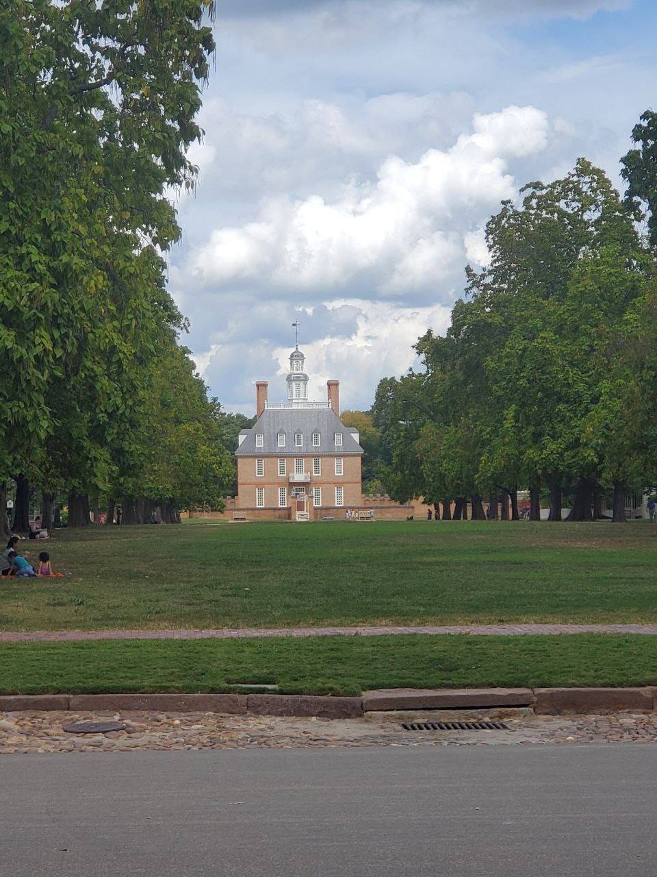 A small park near a historic building in Williamsburg, Virginia.
