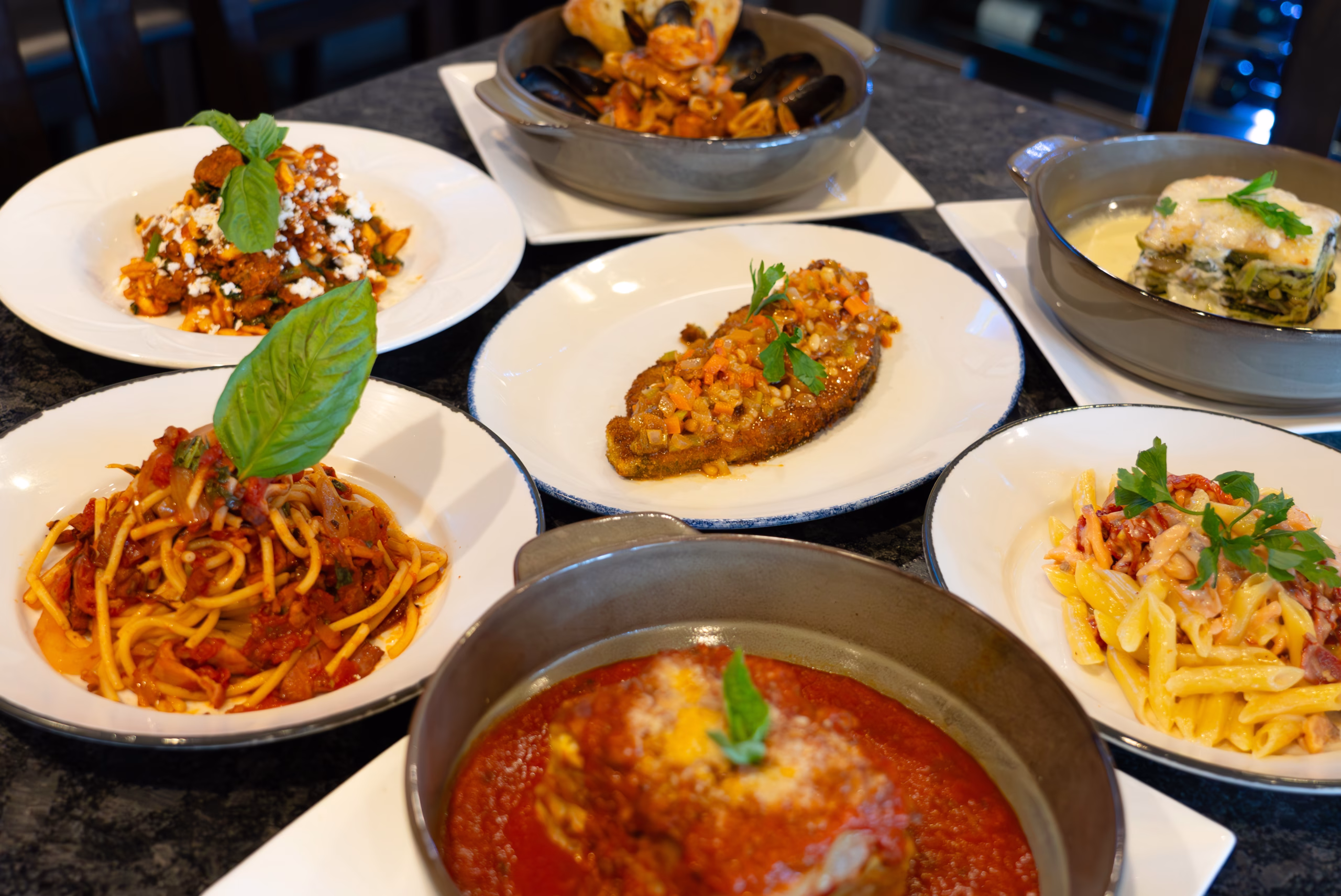different italian pasta dishes at pazzo pomodoro in vienna, virginia