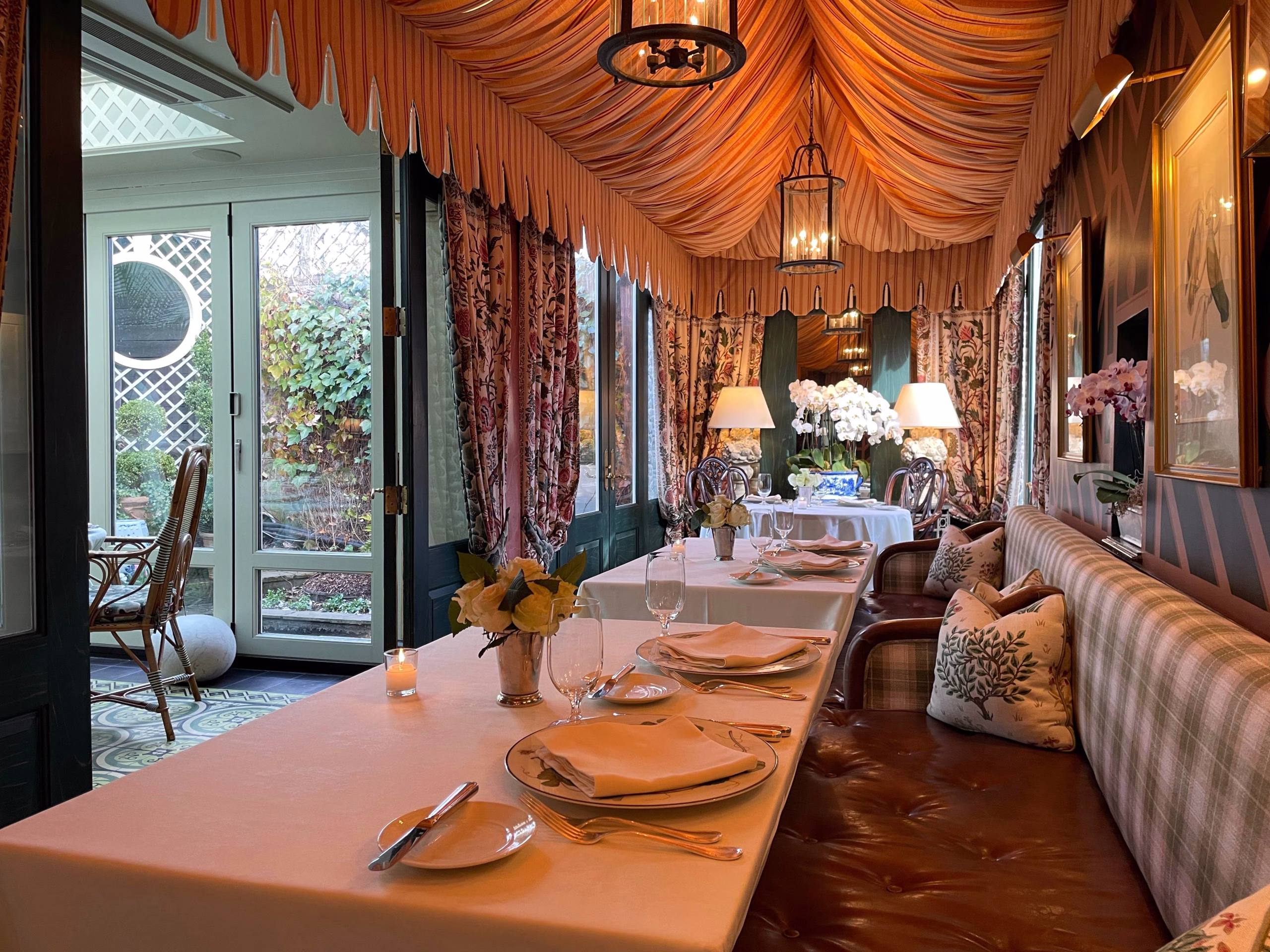 Tables and couch and chairs at The Inn at Little Washington.