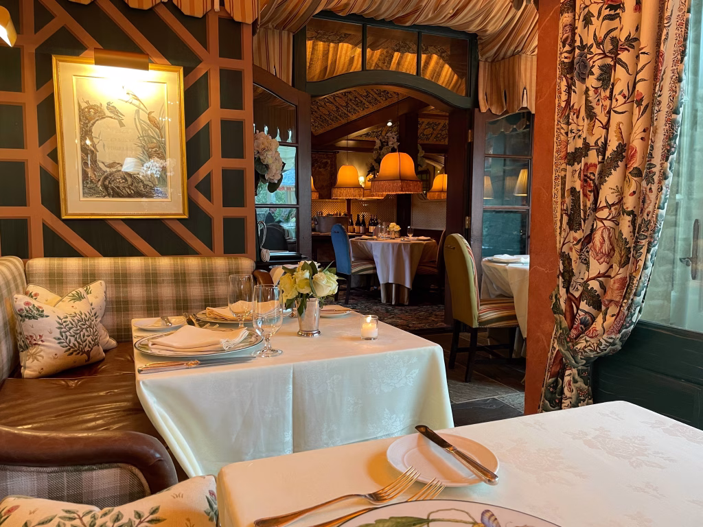 Cozy interiors of The Inn at Little Washington with couches and tables.