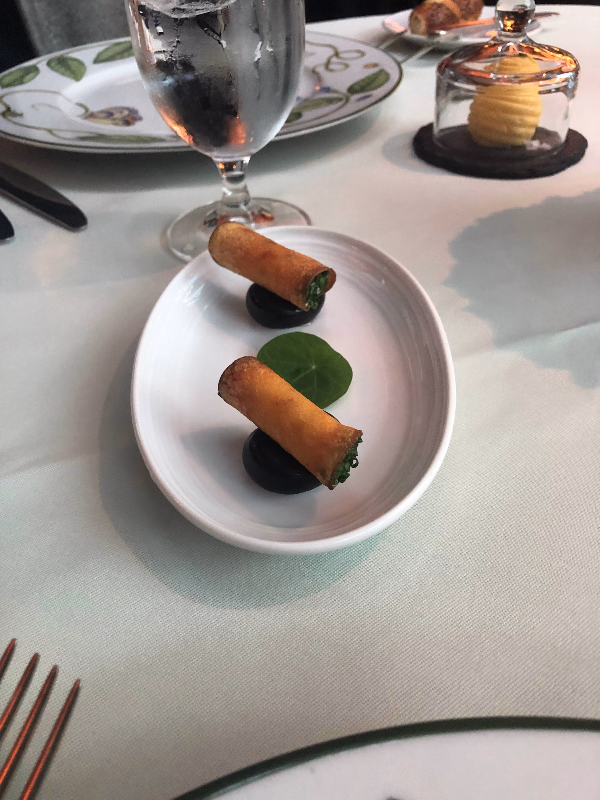Potato chips filled with cheese filling amuse bouche at The Inn at Little Washington.