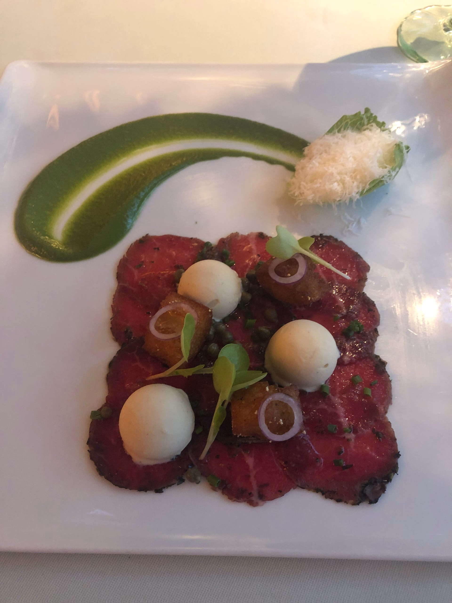 Beef carpaccio with caesar salad ice cream at The Inn at Little Washington.