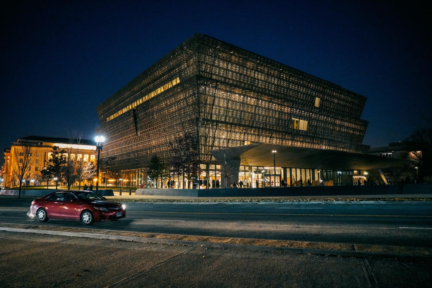 The exterior of a museum in Washington DC seen from across a street.