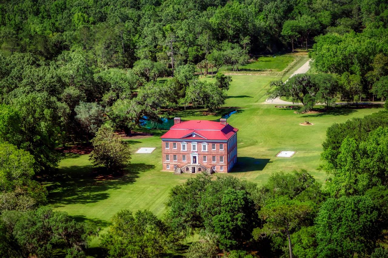 An aerial view of Drayton Hall surrounded by trees.