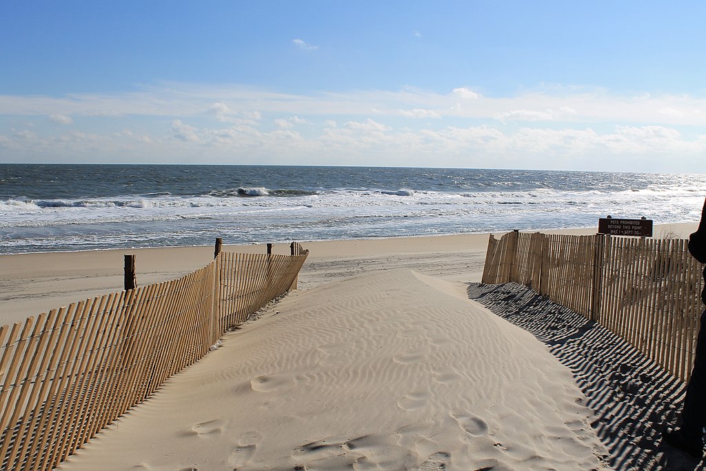 Smooth sand path toward a beach in Delaware.