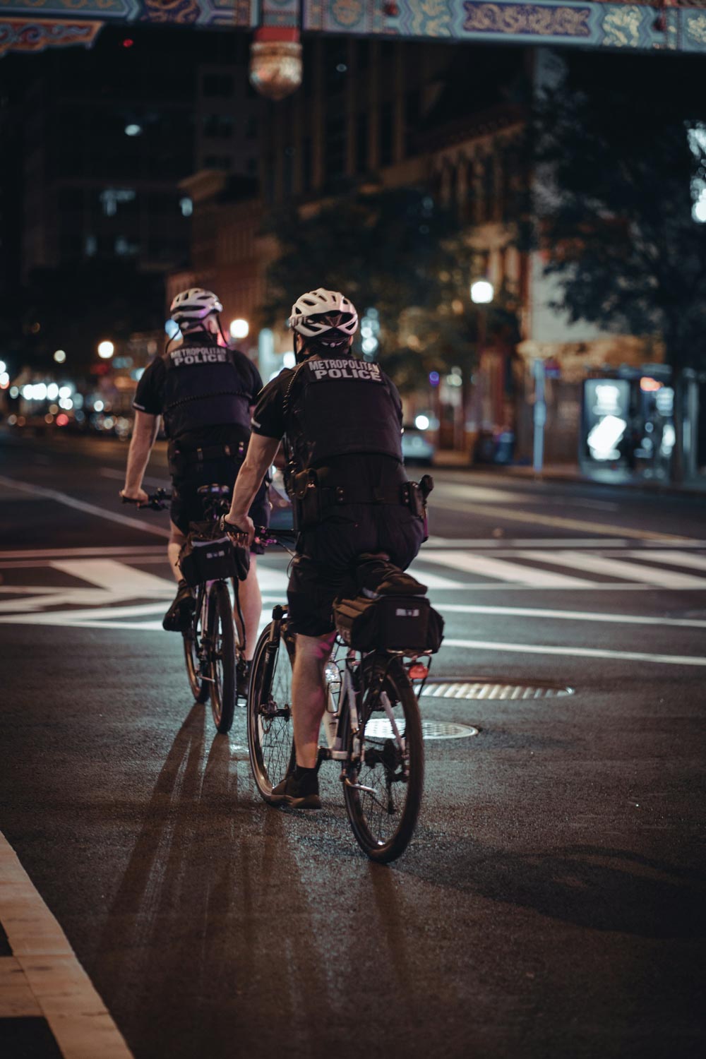 Two police officers riding a bike in Washington DC.
