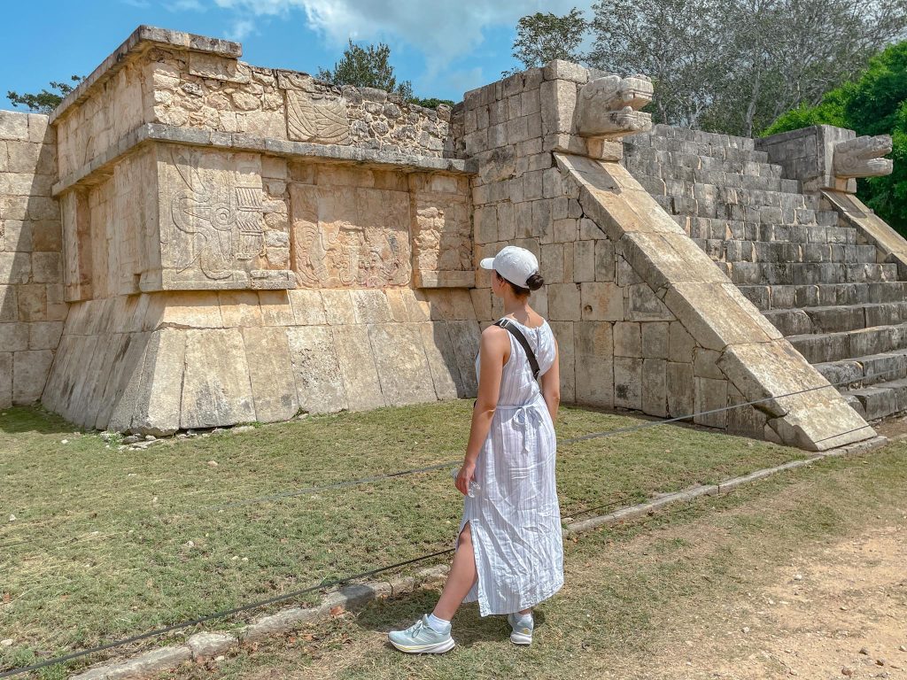 girl looking at mayan ruins