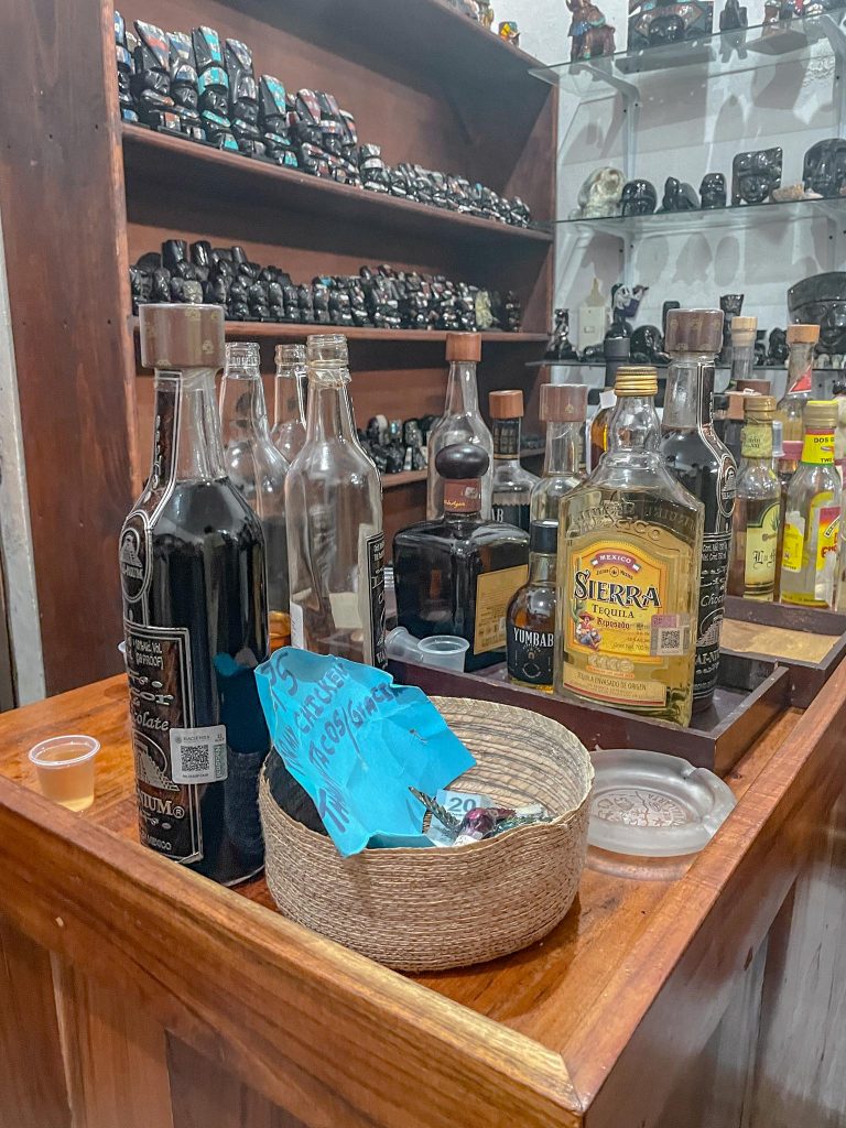 bottles of mayan tequila on a table