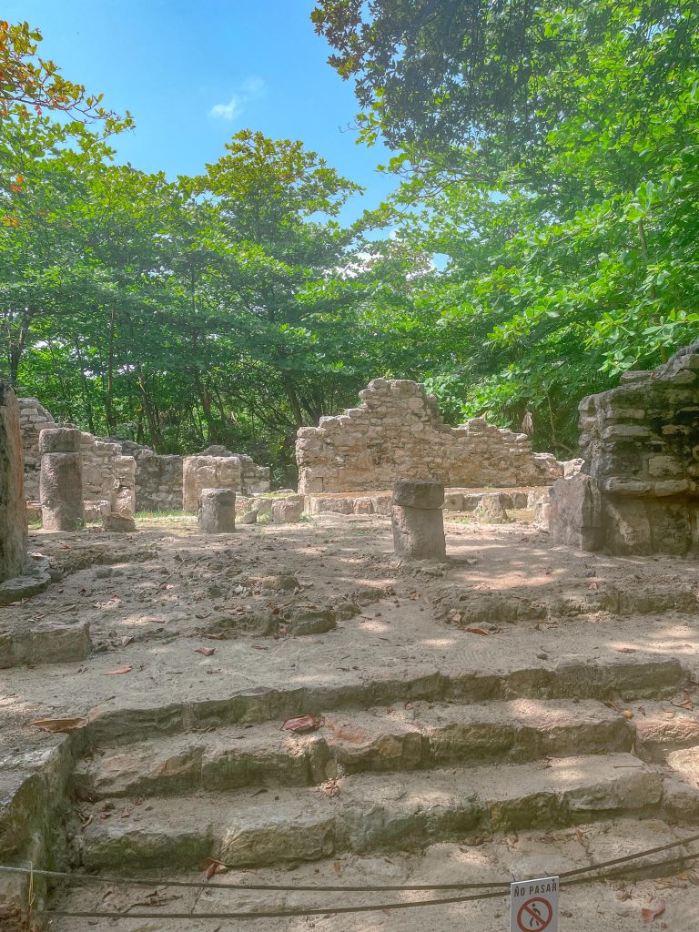 mayan ruins with lots of columns