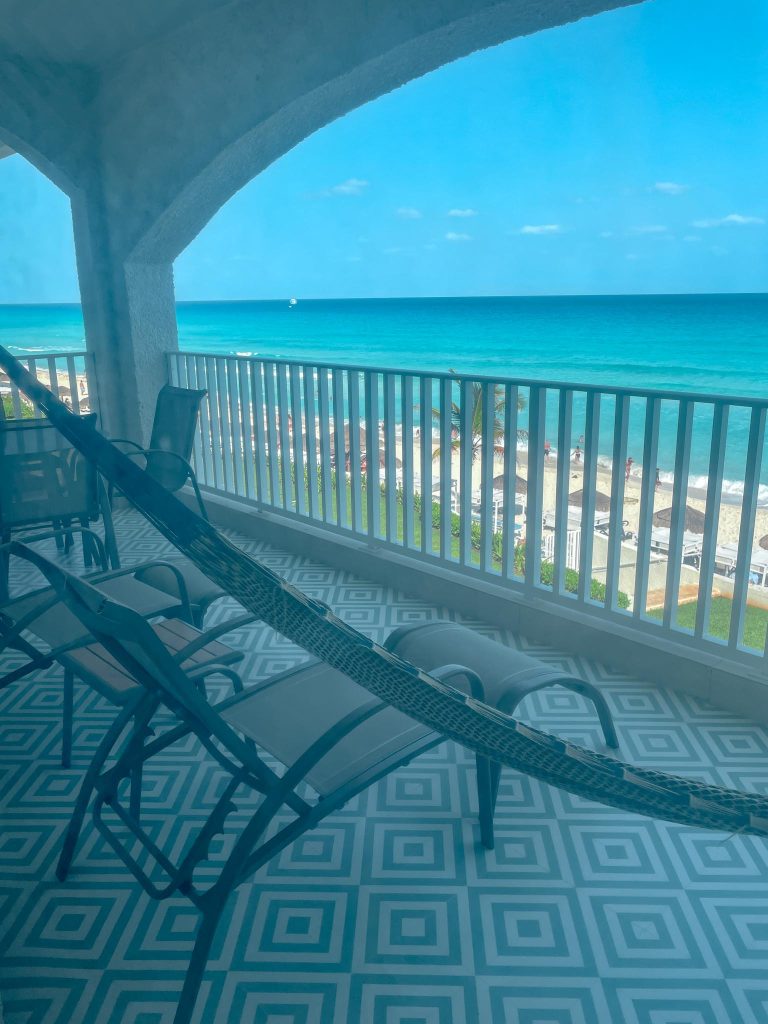 hotel room balcony with ocean view
