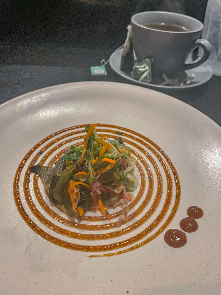 miso and seaweed salad dish at asian restaurant