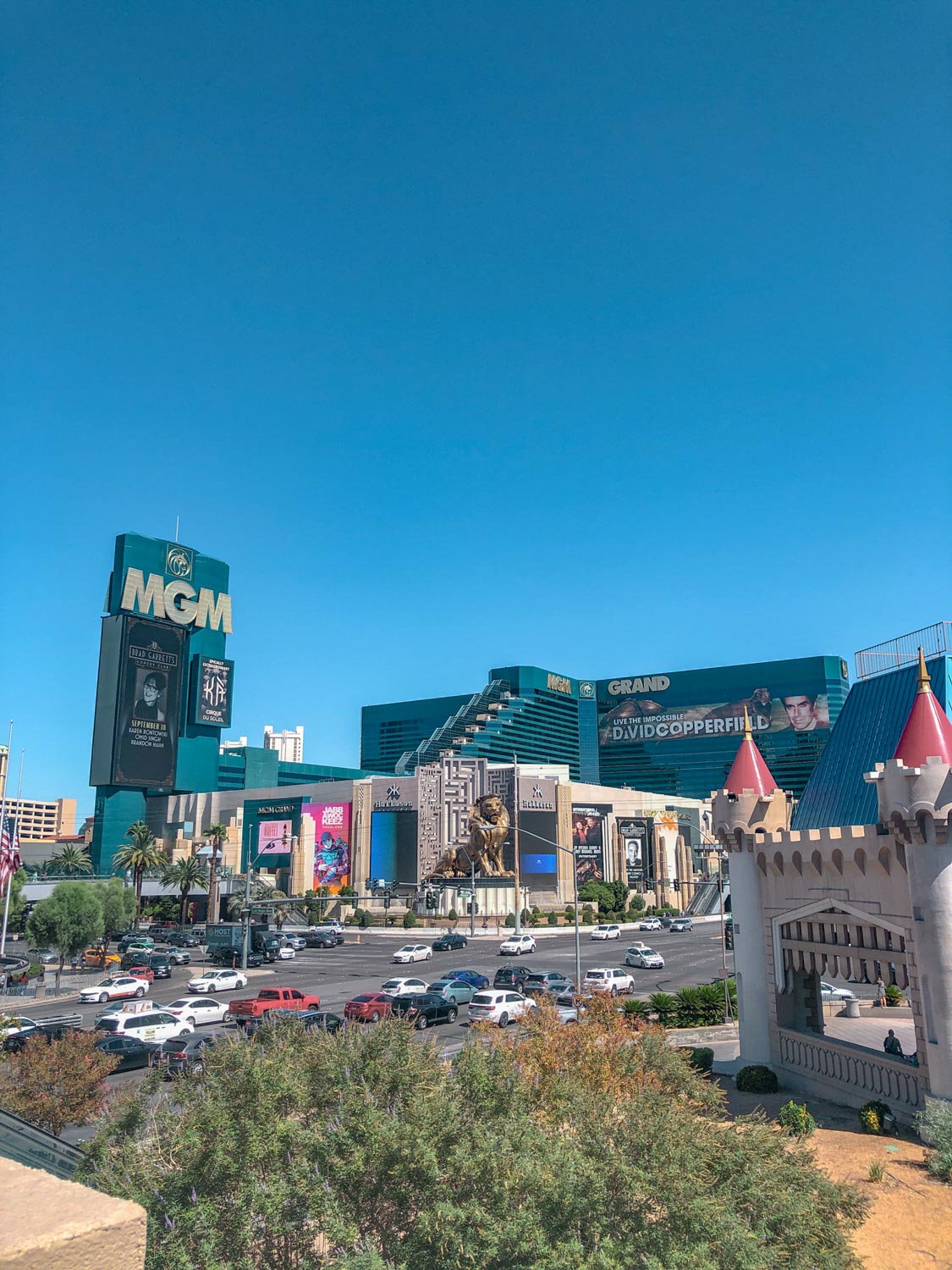 Highway with cars surrounded by hotels in Las Vegas.