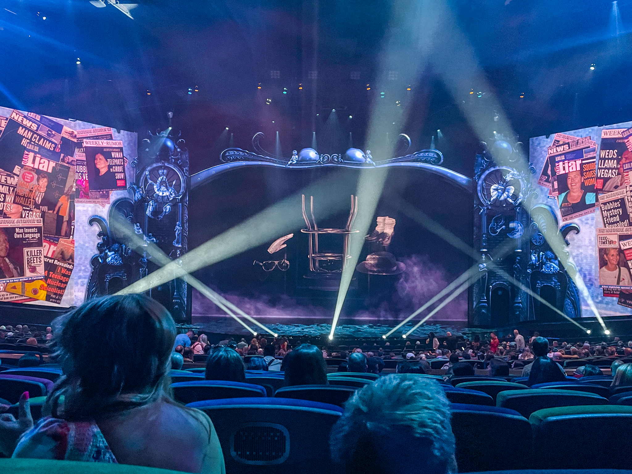 People watching a show in a Las Vegas hotel theater.