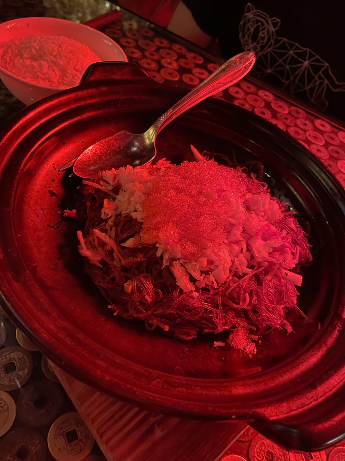 A plate of noodles on a table.