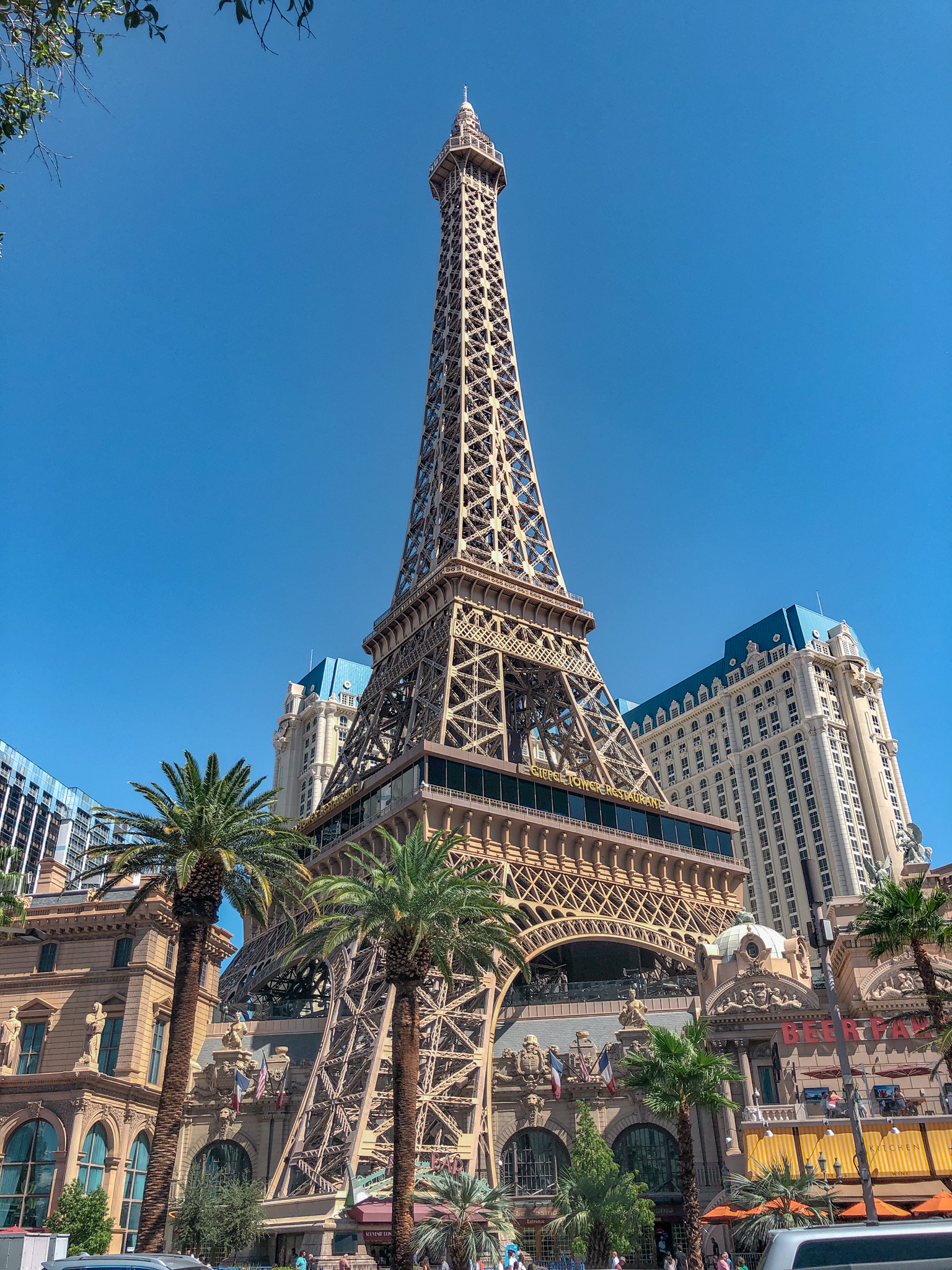 A replica of the Eiffel Tower surrounded by hotels in Las Vegas.