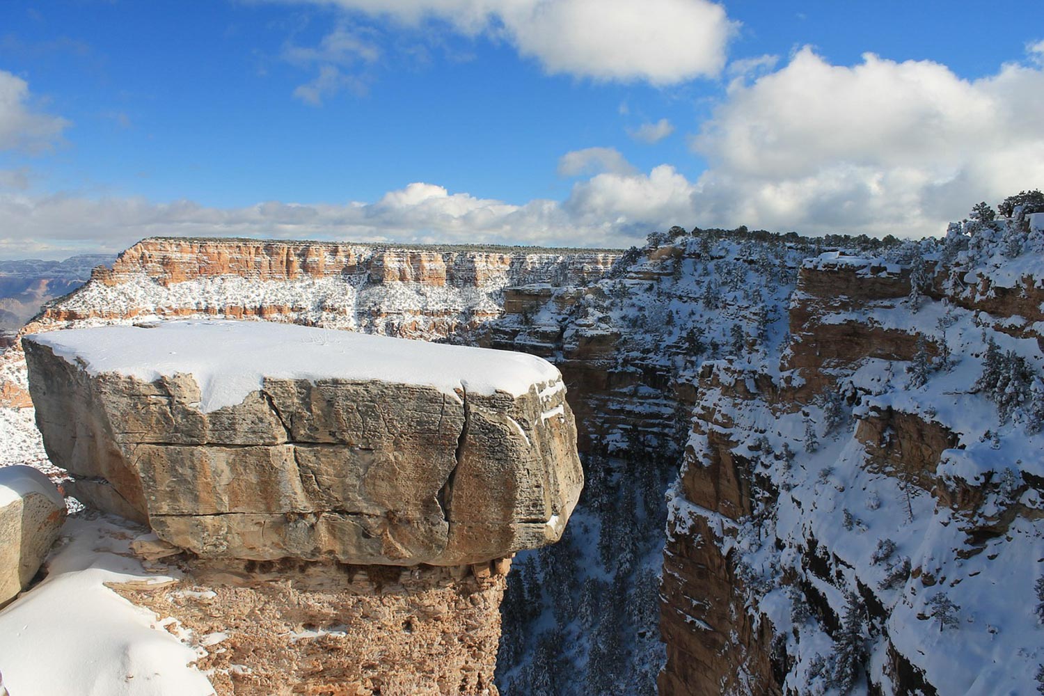Grand Canyon South Rim partly covered in snow.