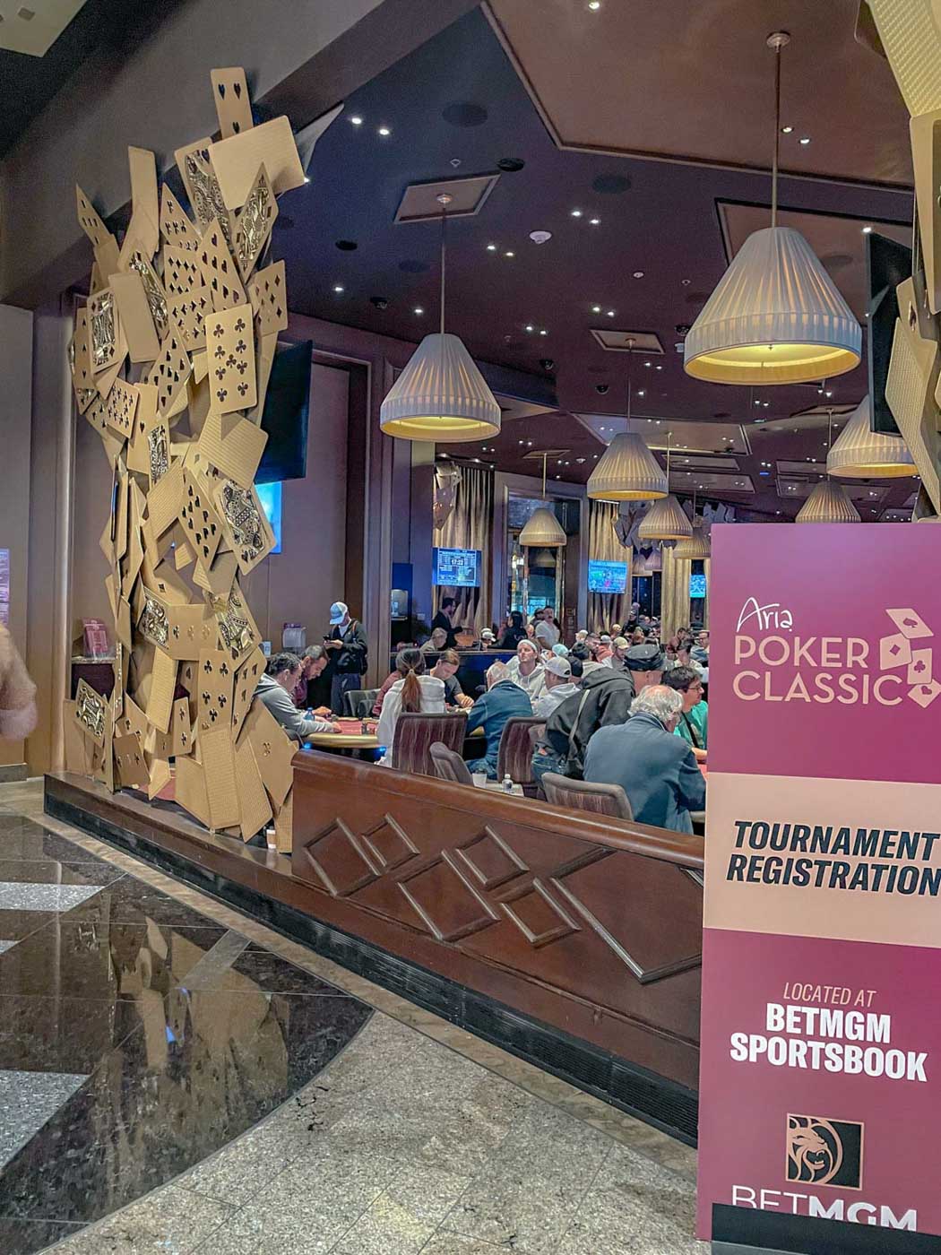 The entrance to a poker hall in a hotel casino.