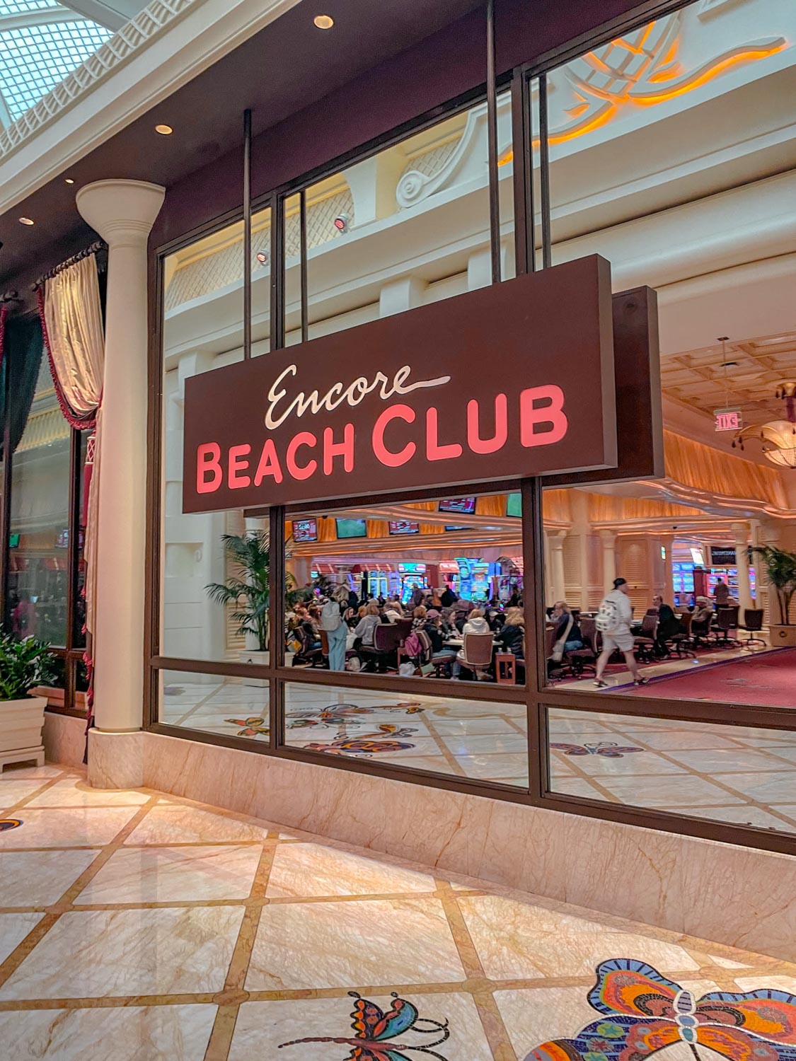A sign that says "Encore Beach Club" inside a hotel in Las Vegas.