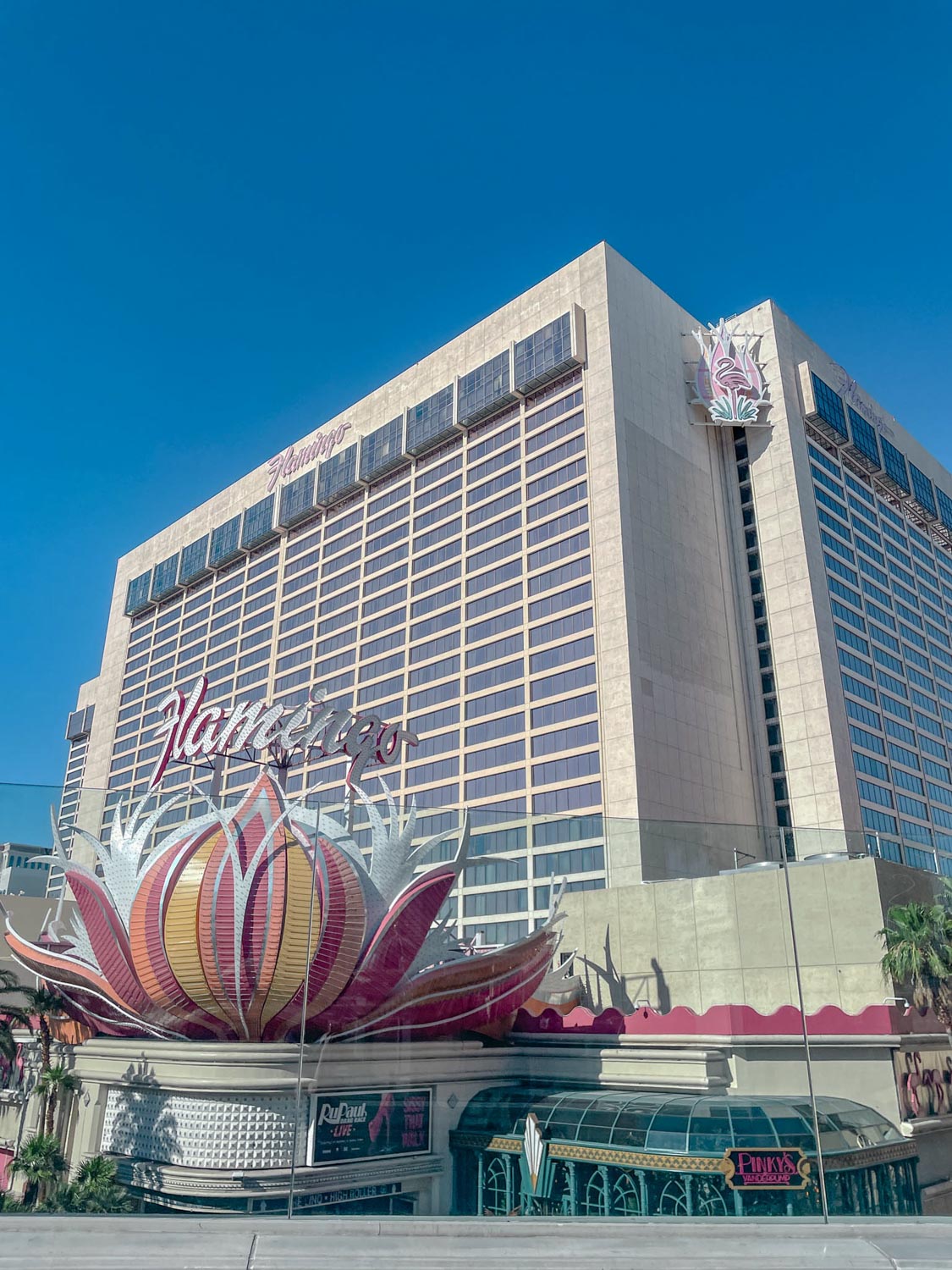 The building of a hotel on the Las Vegas Strip with a giant installation of pink lotus flower.