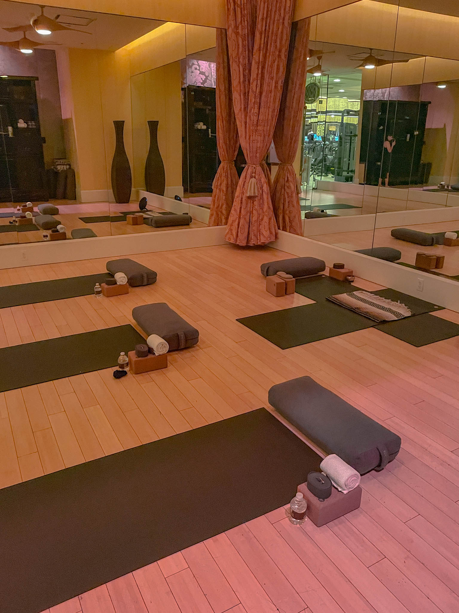 Yoga mats on the floor of a hotel spa.