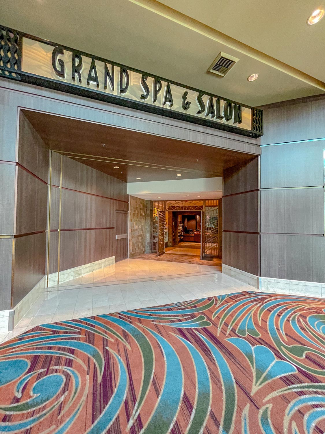 The entrance of the spa in MGM Grand with a sign that says, "Grand Spa & Salon".