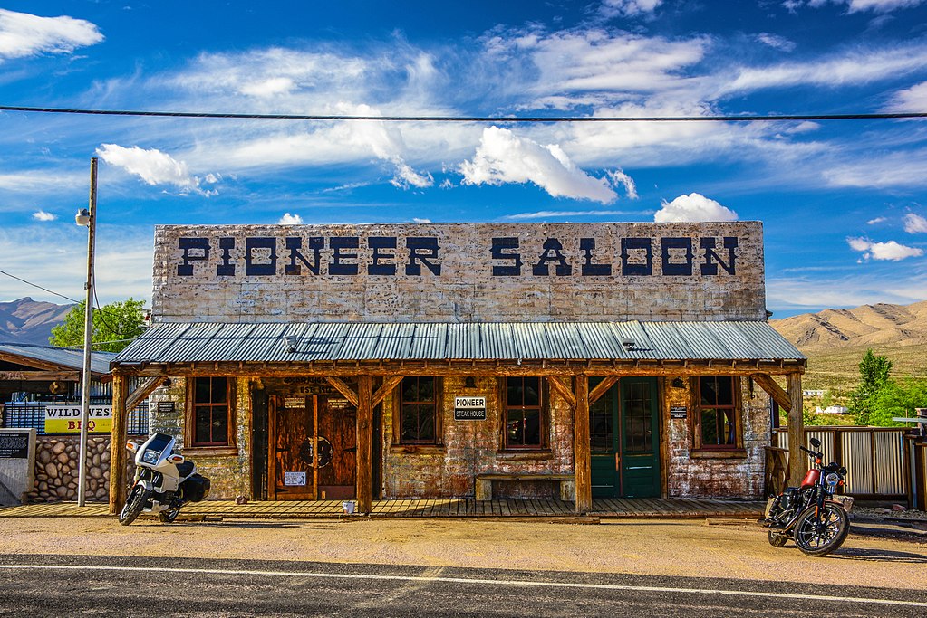 The front of Pioneer Saloon bar building with motorcycles.