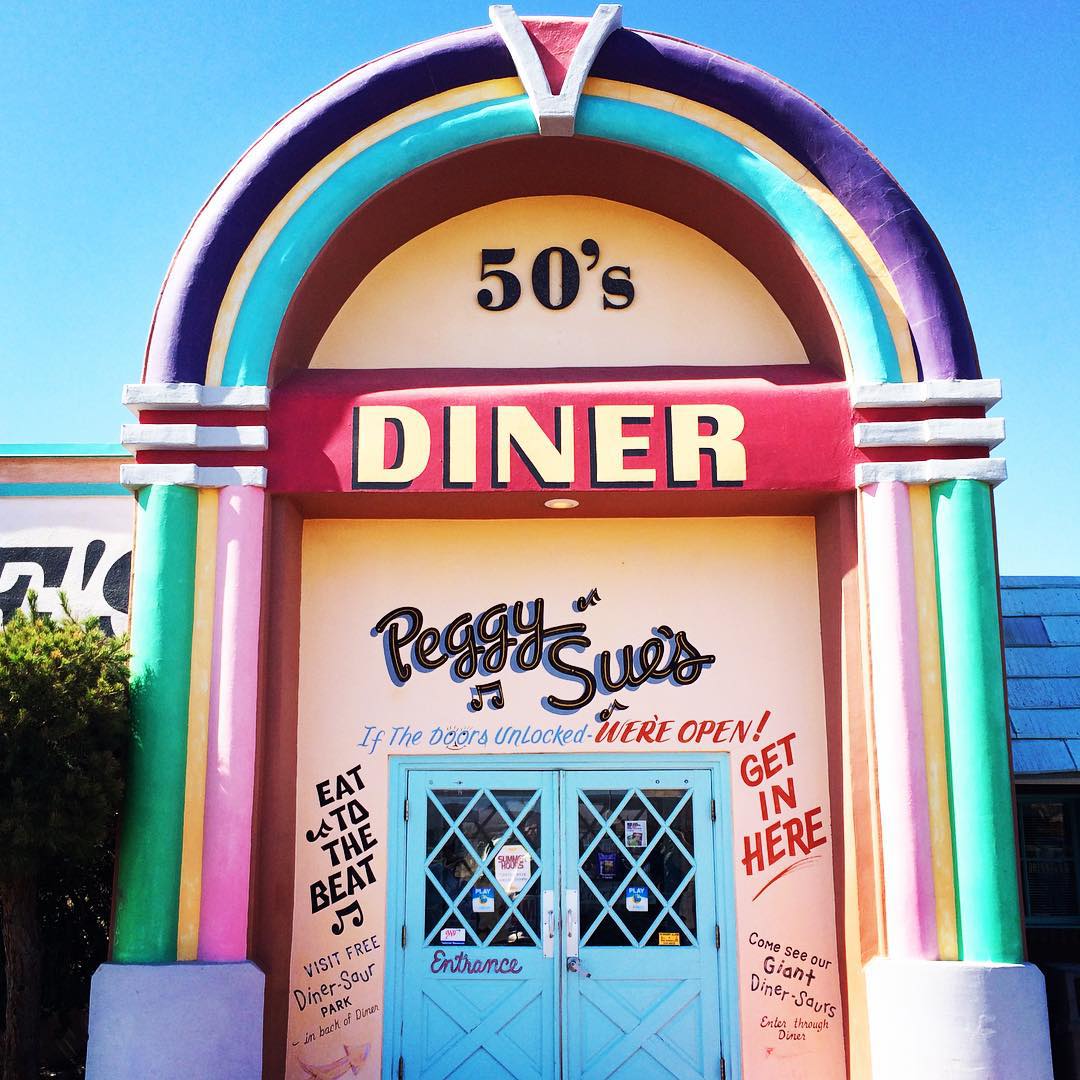 The colorful front and door of Peggy Sue's 50s Diner.