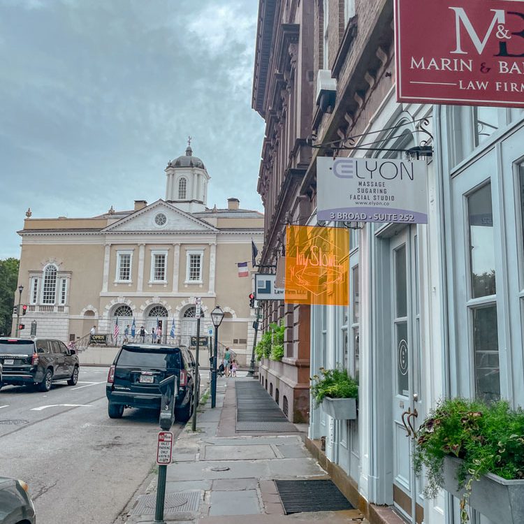 Storefront of boutiques and stores in Charleston, South Carolina.