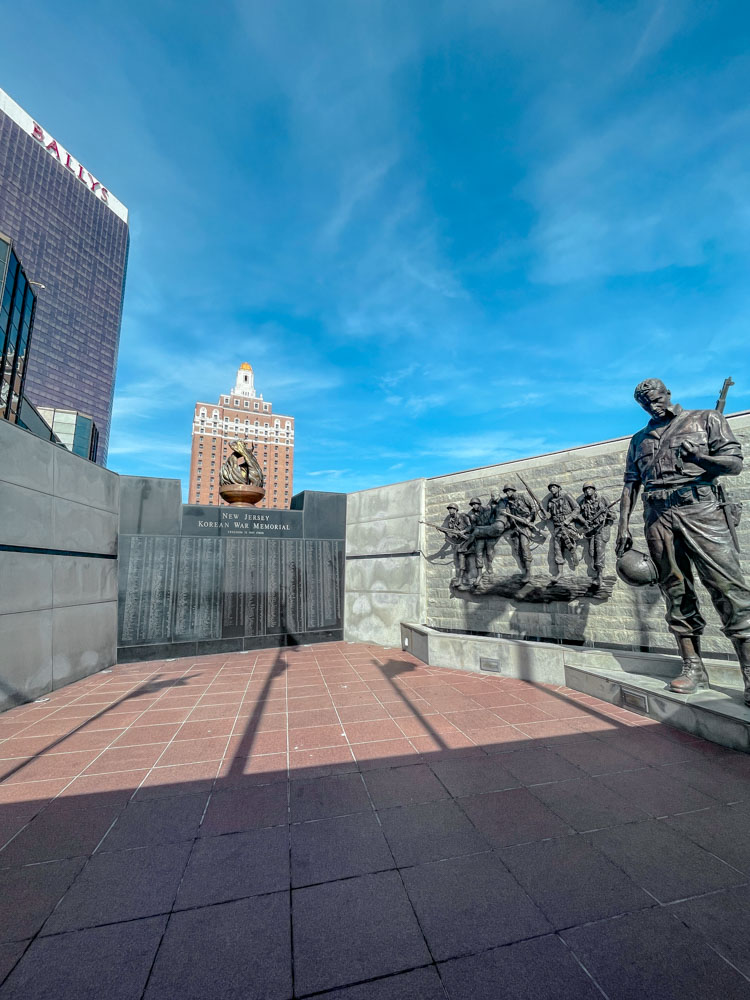 A war memorial in Atlantic City with statues.