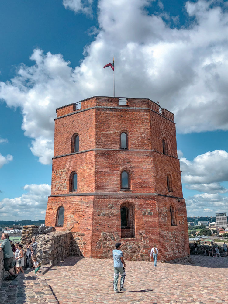 Gediminas Castle with flag on top in Vilnius.