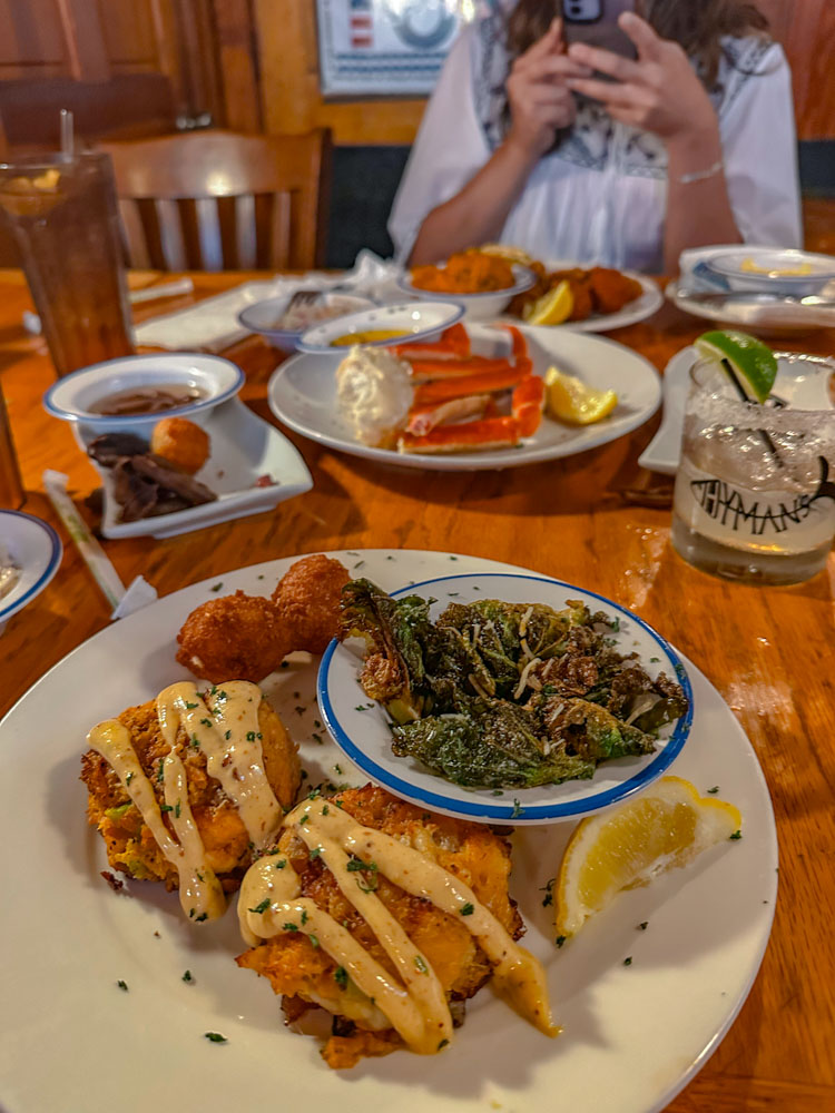 Food on plates on a wooden table.