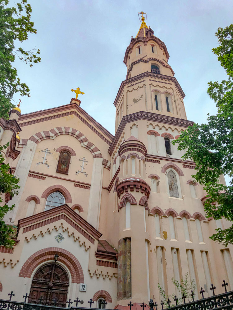 A church surrounded by trees in Vilnius.