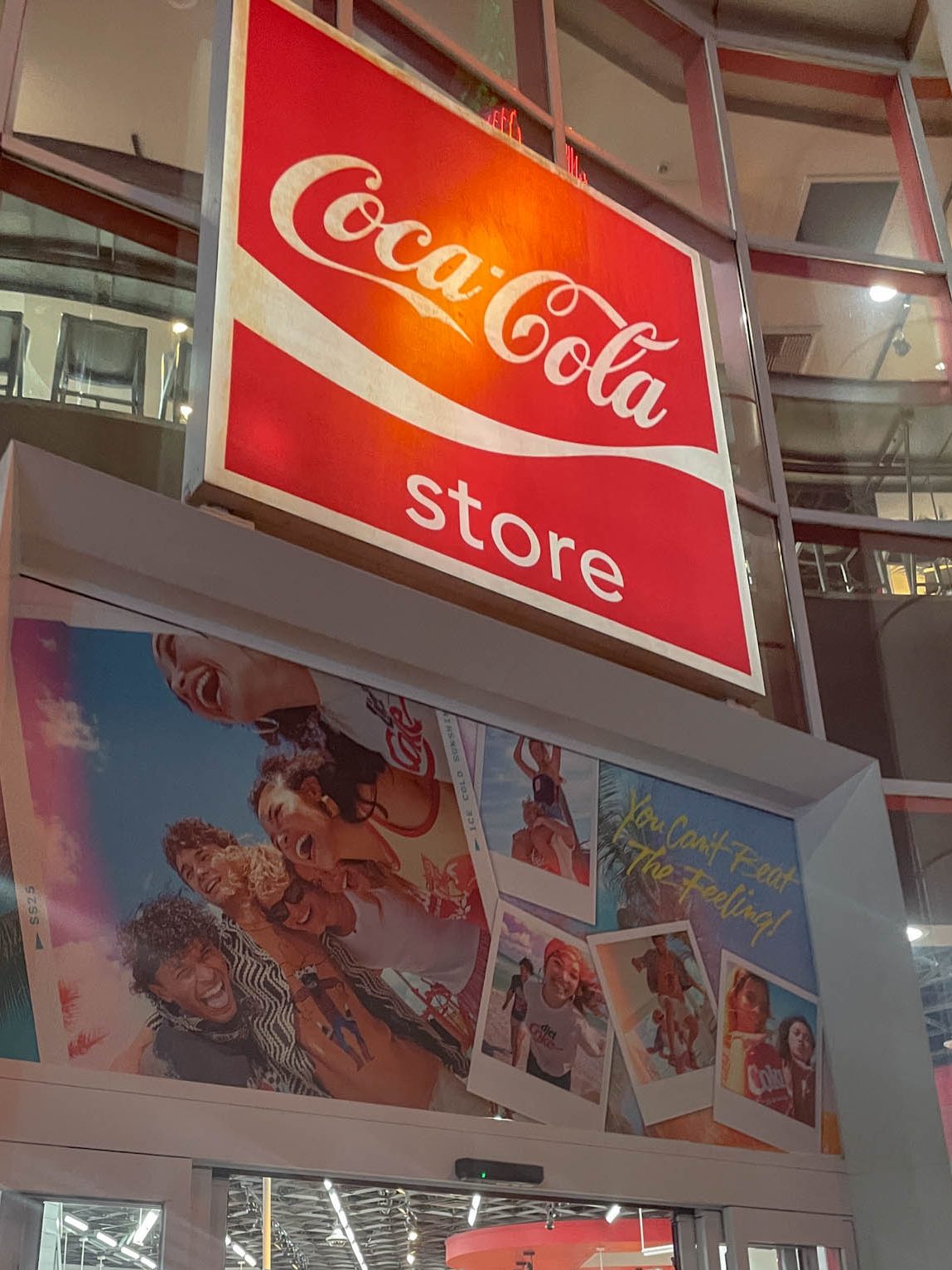 A storefront sign that says "Coca-Cola store".