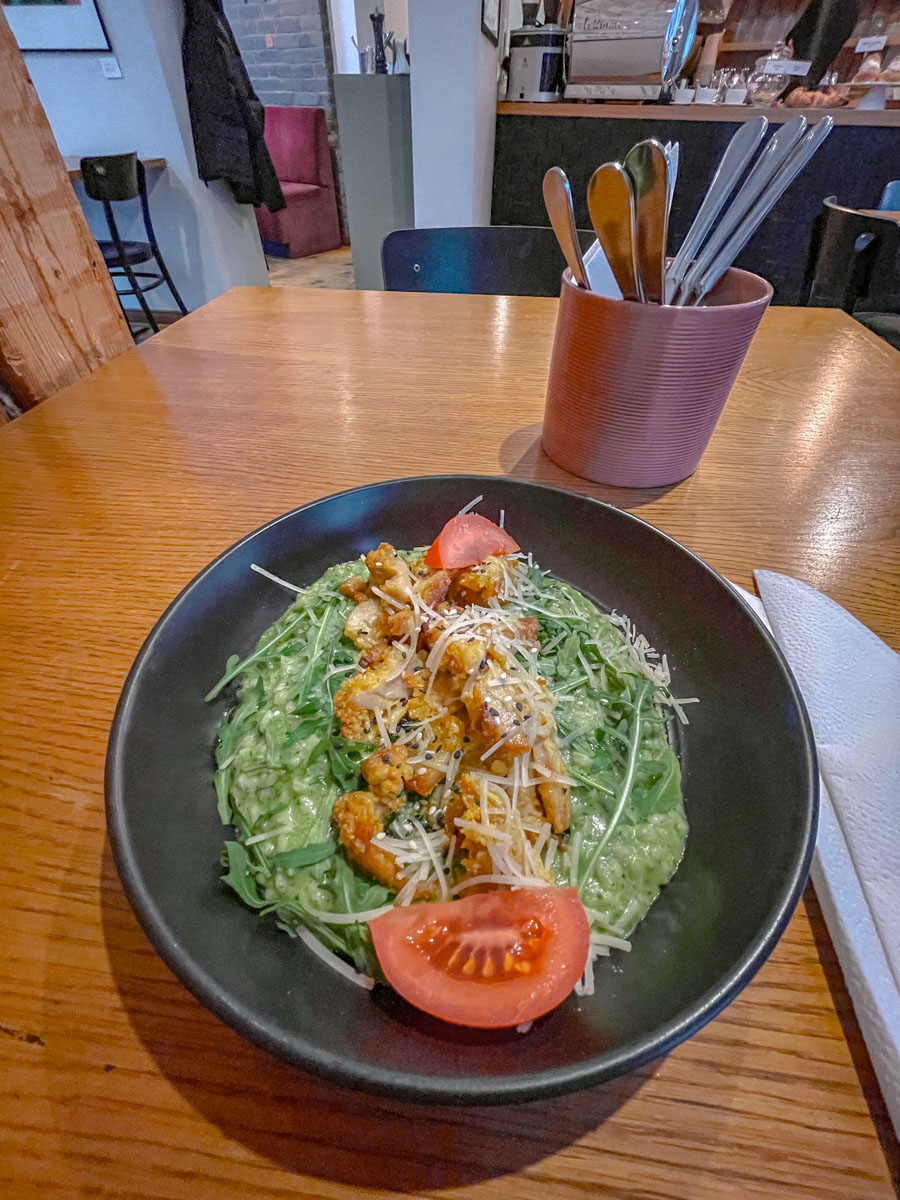 Meat and vegetable dish on a bowl plate.