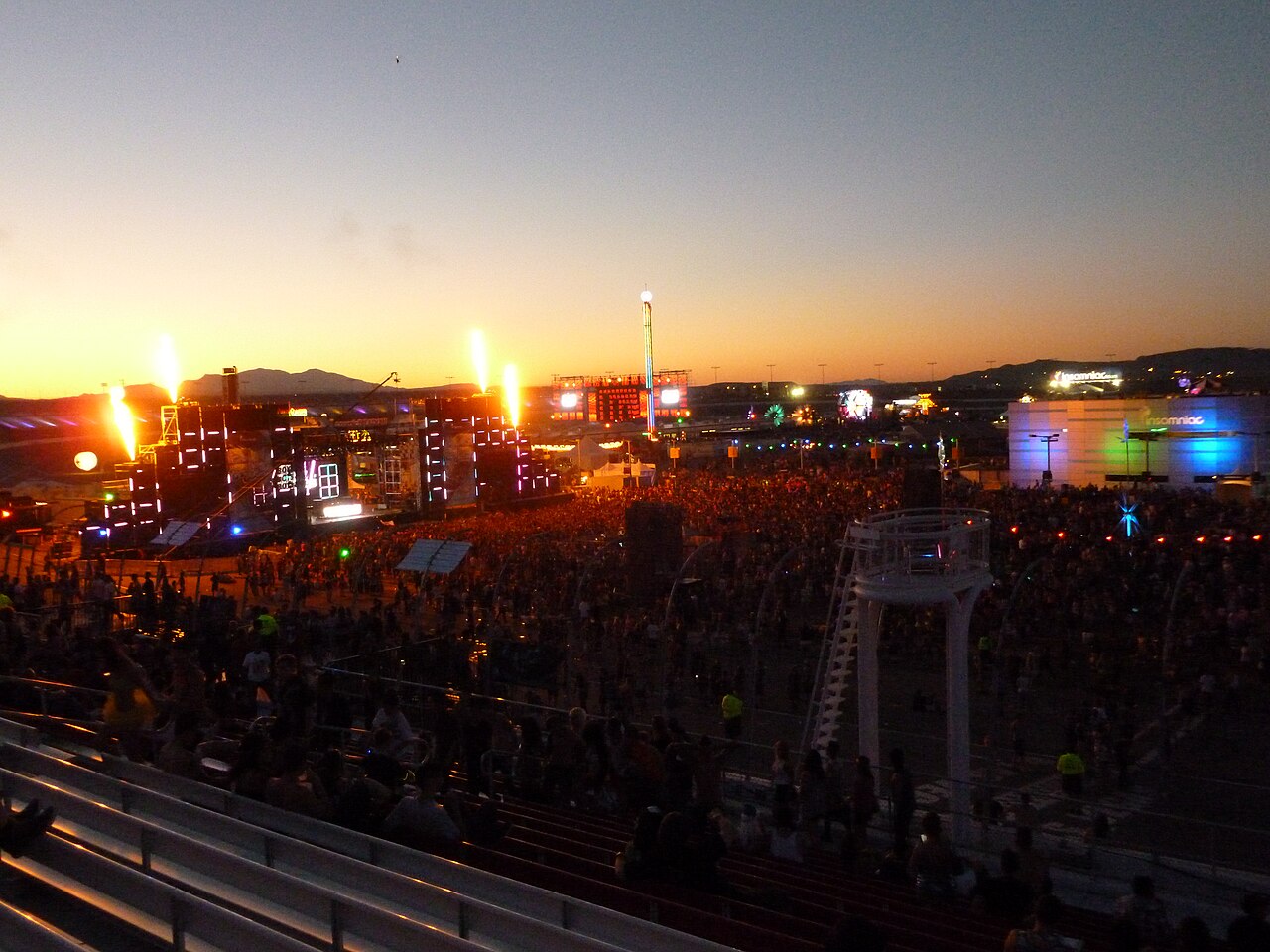 A view of Electric Daisy Carnival stage and crowd in Las Vegas at sunset.
