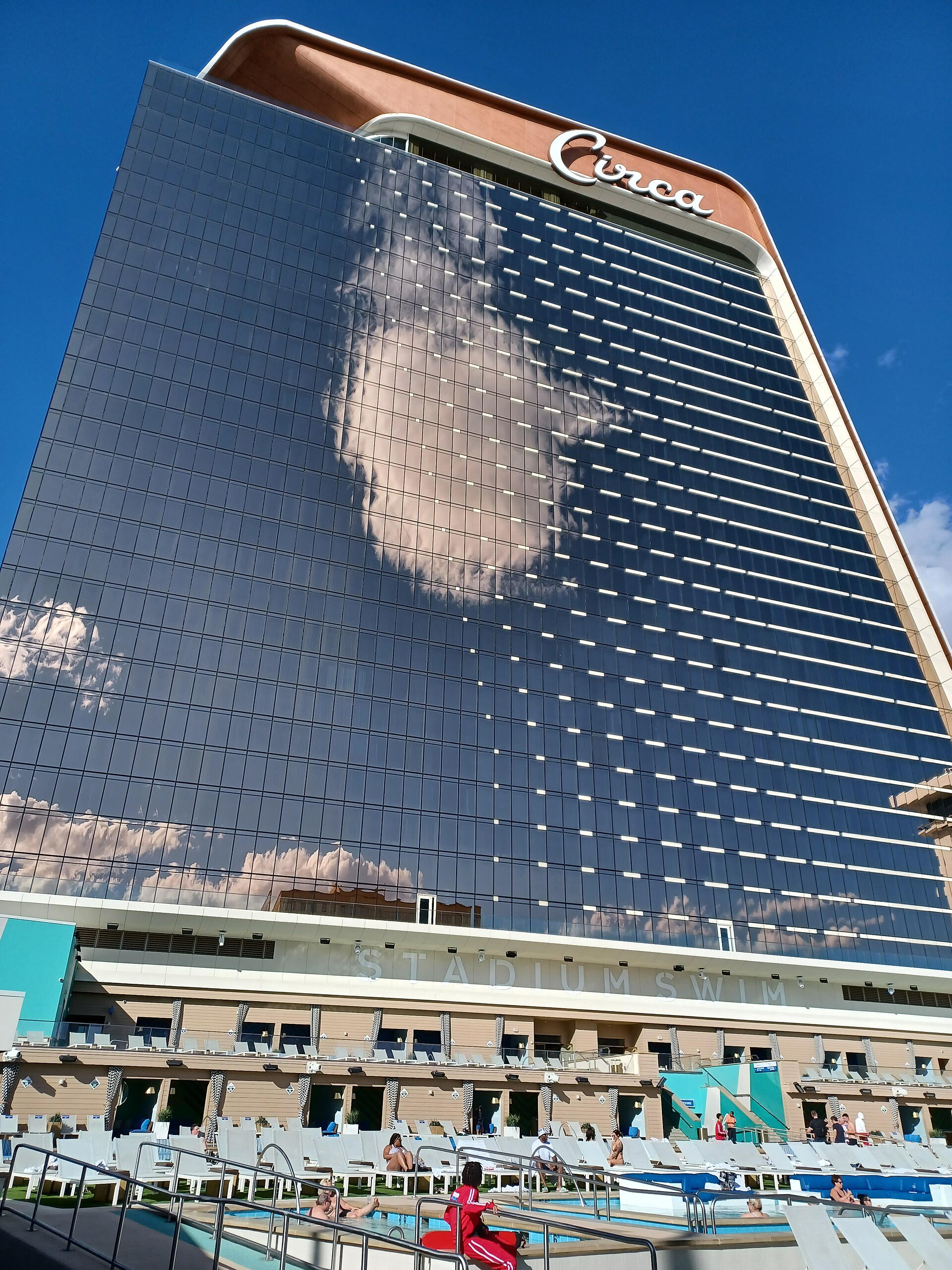 The pool area and the glass windows of a hotel in Las Vegas.