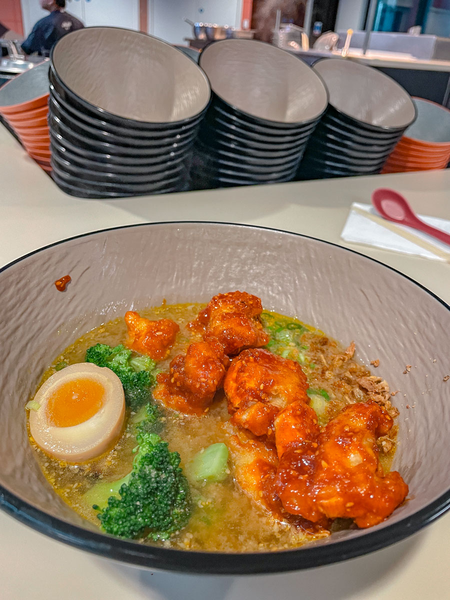 Dish with broccoli and egg and meat in a bowl.