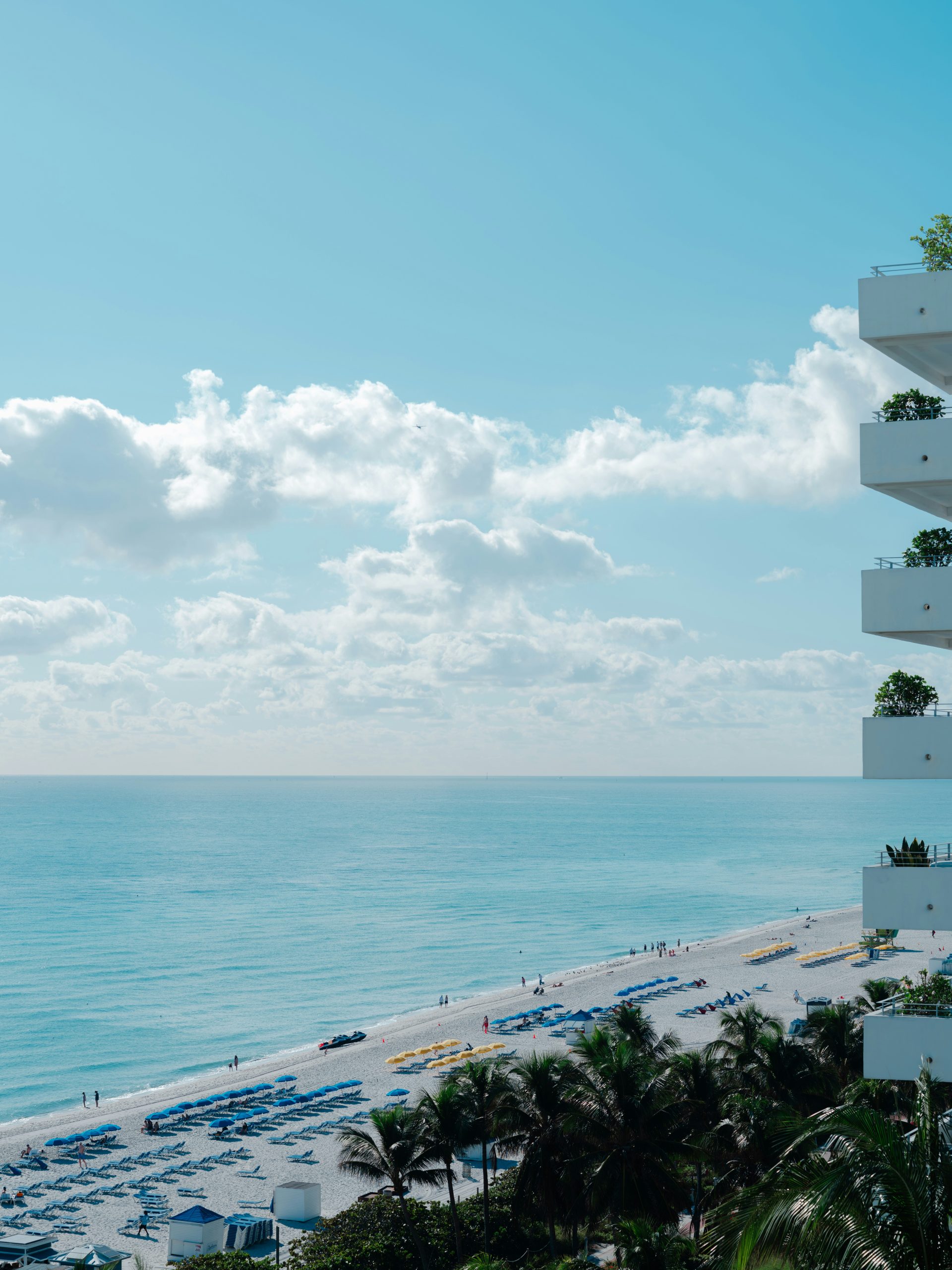 South Beach in Miami under white clouds.