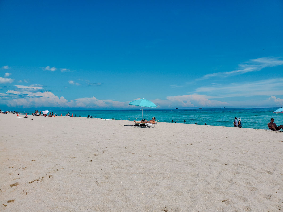 People hanging out at a beach in Key West, Florida.