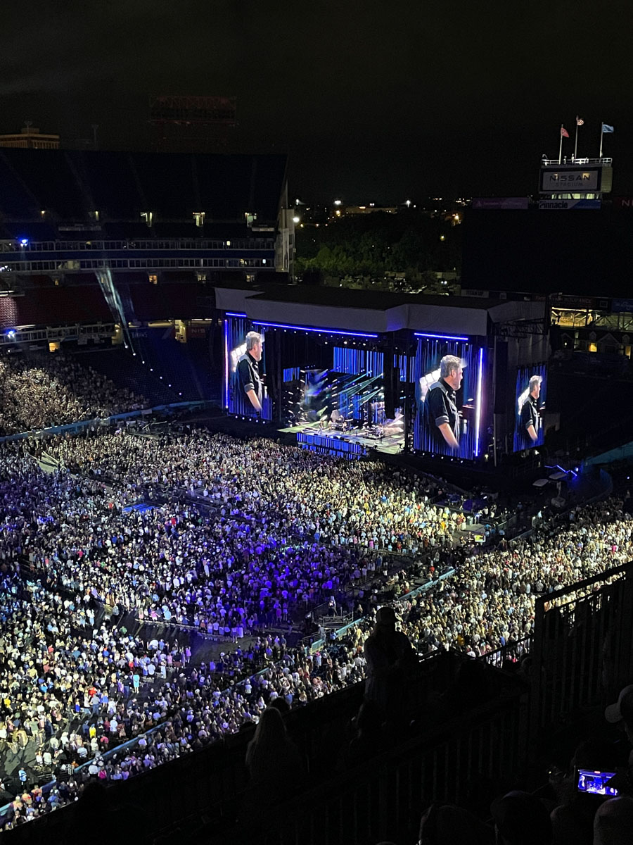 The stage and crowd at a stadium during a concert in Nashville, Tennessee nightlife.