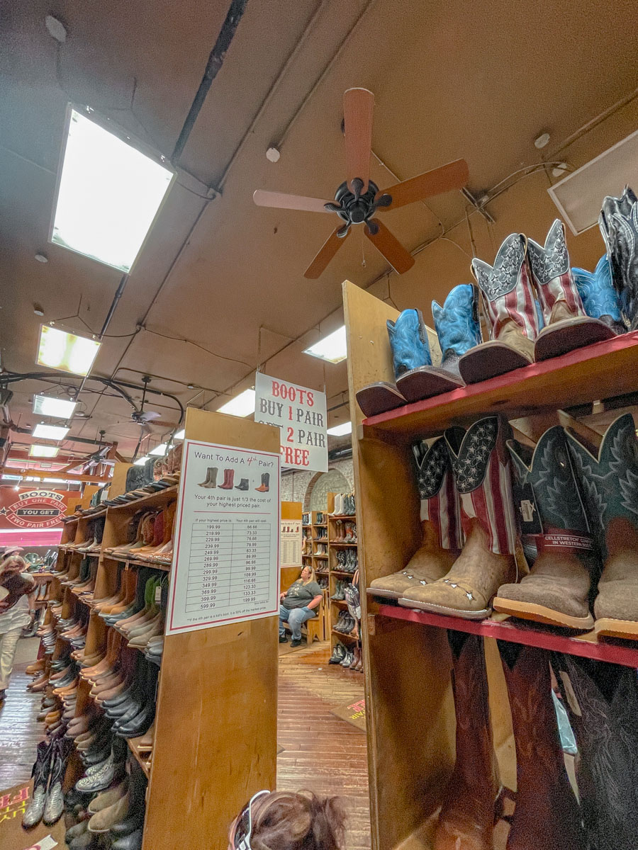 Shelves of various boots inside a boot shop in Nashville Tennessee.