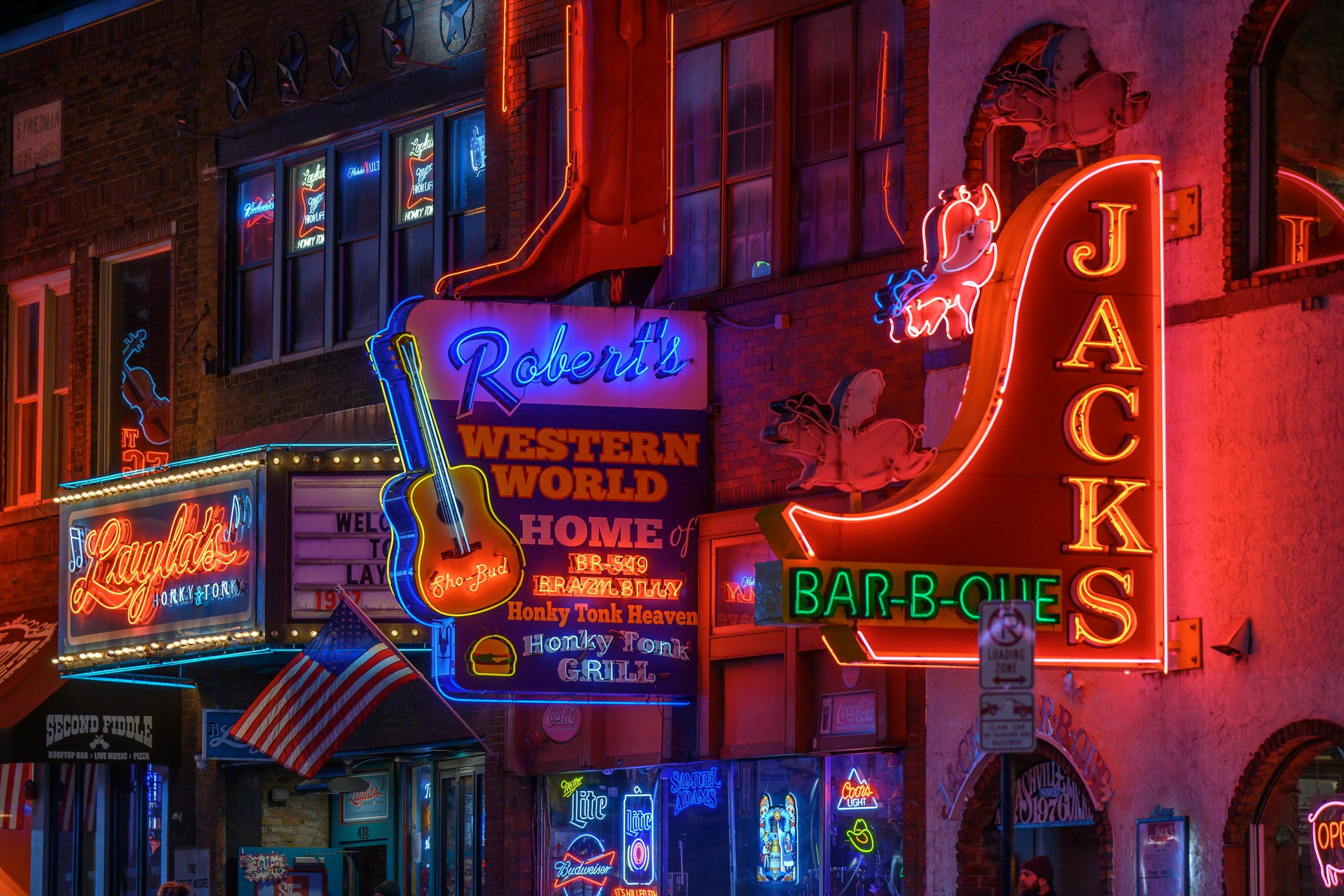 Neon light signs of restaurants and bars in Nashville.