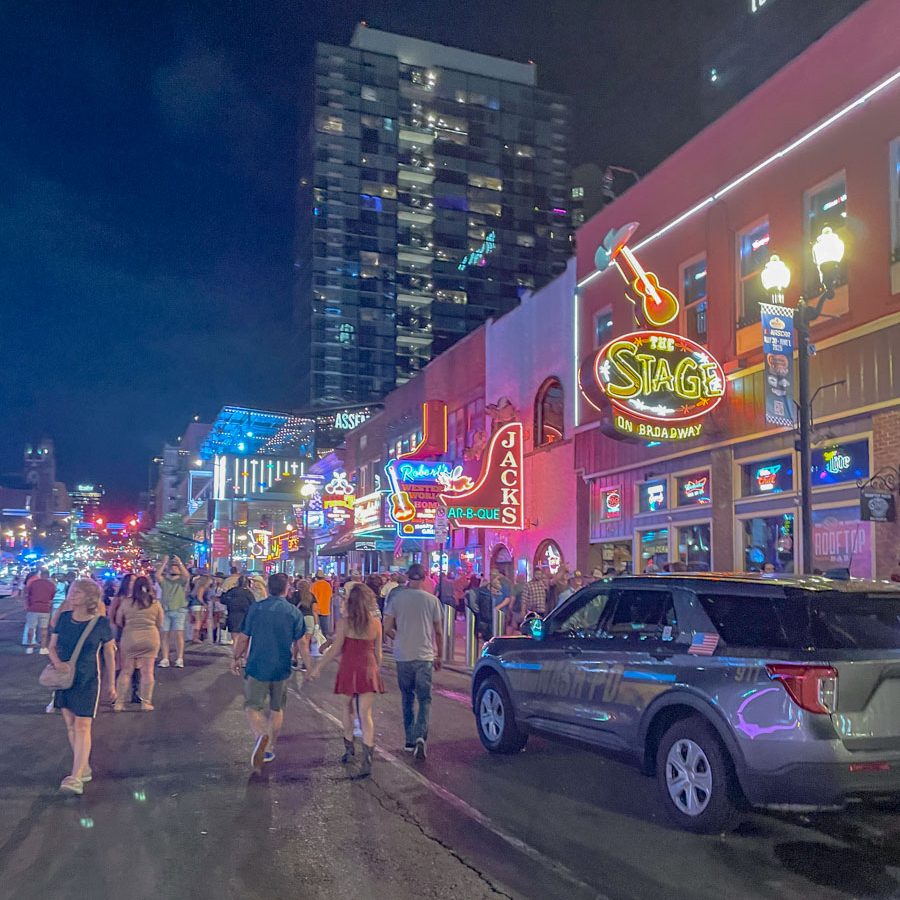 People walking at Downtown Nashville at night.