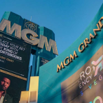 The outside of MGM Grand Las Vegas buildings with signs "MGM" and "MGM Grand".