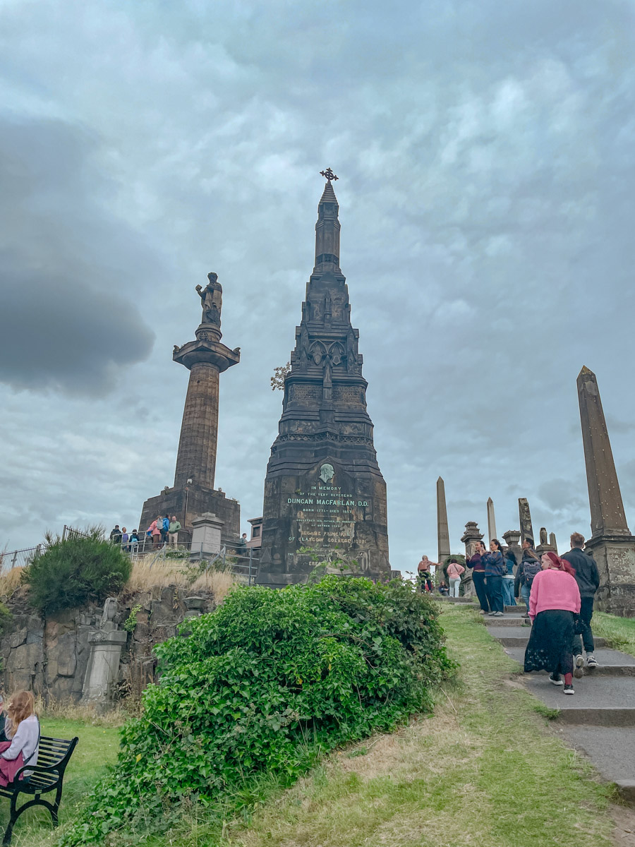 People walking in Glasgow Necropolis.