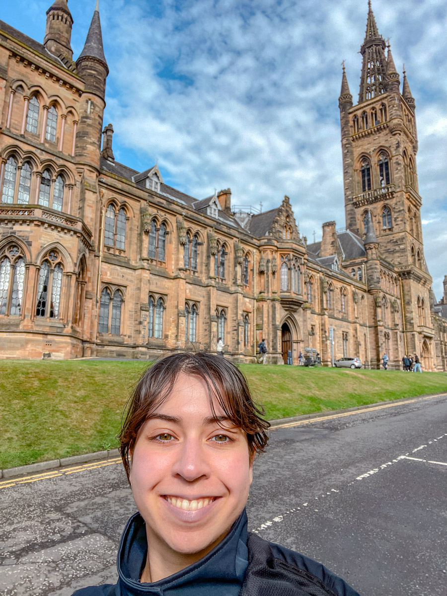 A woman outside University of Glasgow.
