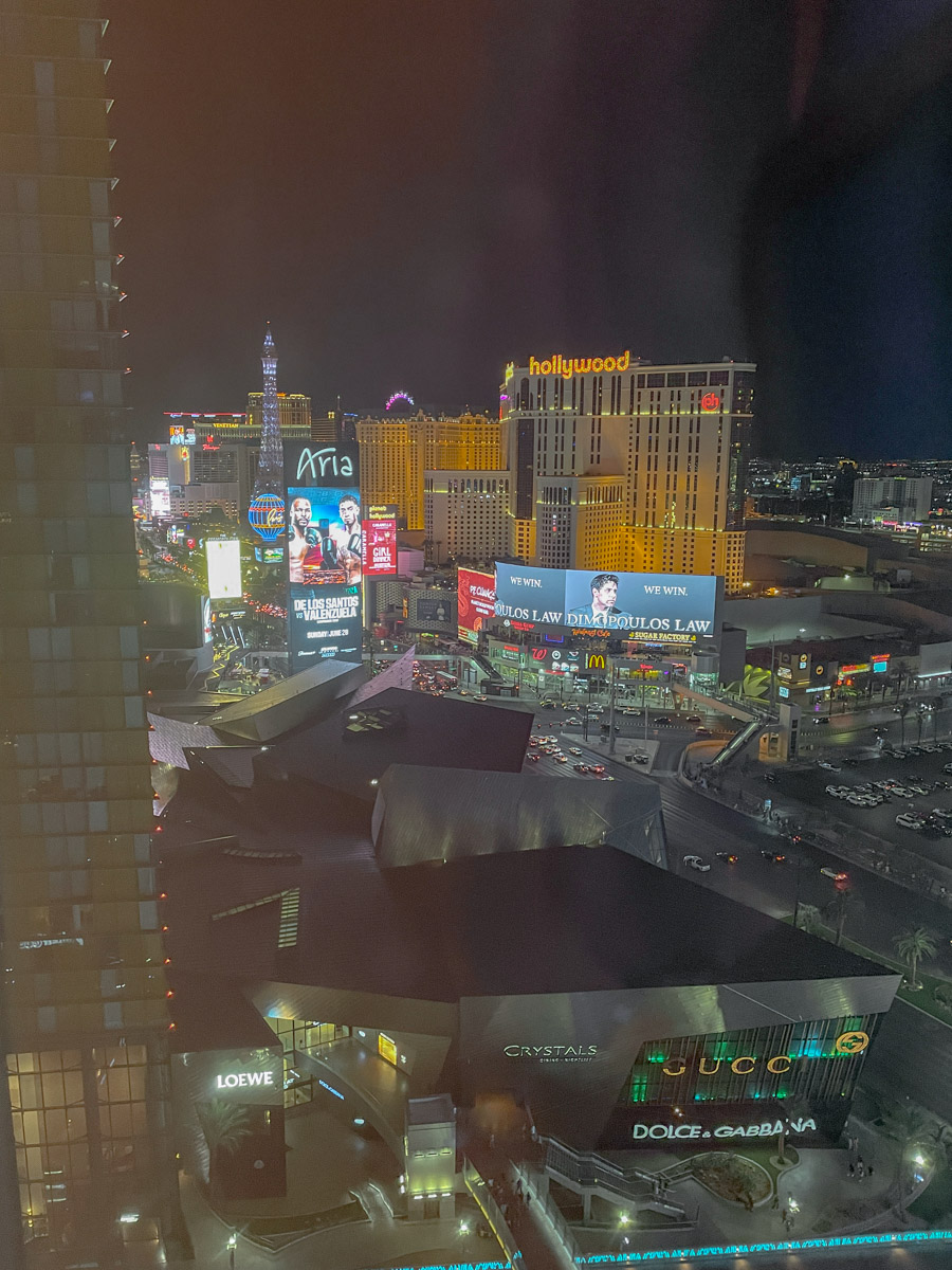 Views of Las Vegas from a Waldorf Astoria Las Vegas hotel room at night.