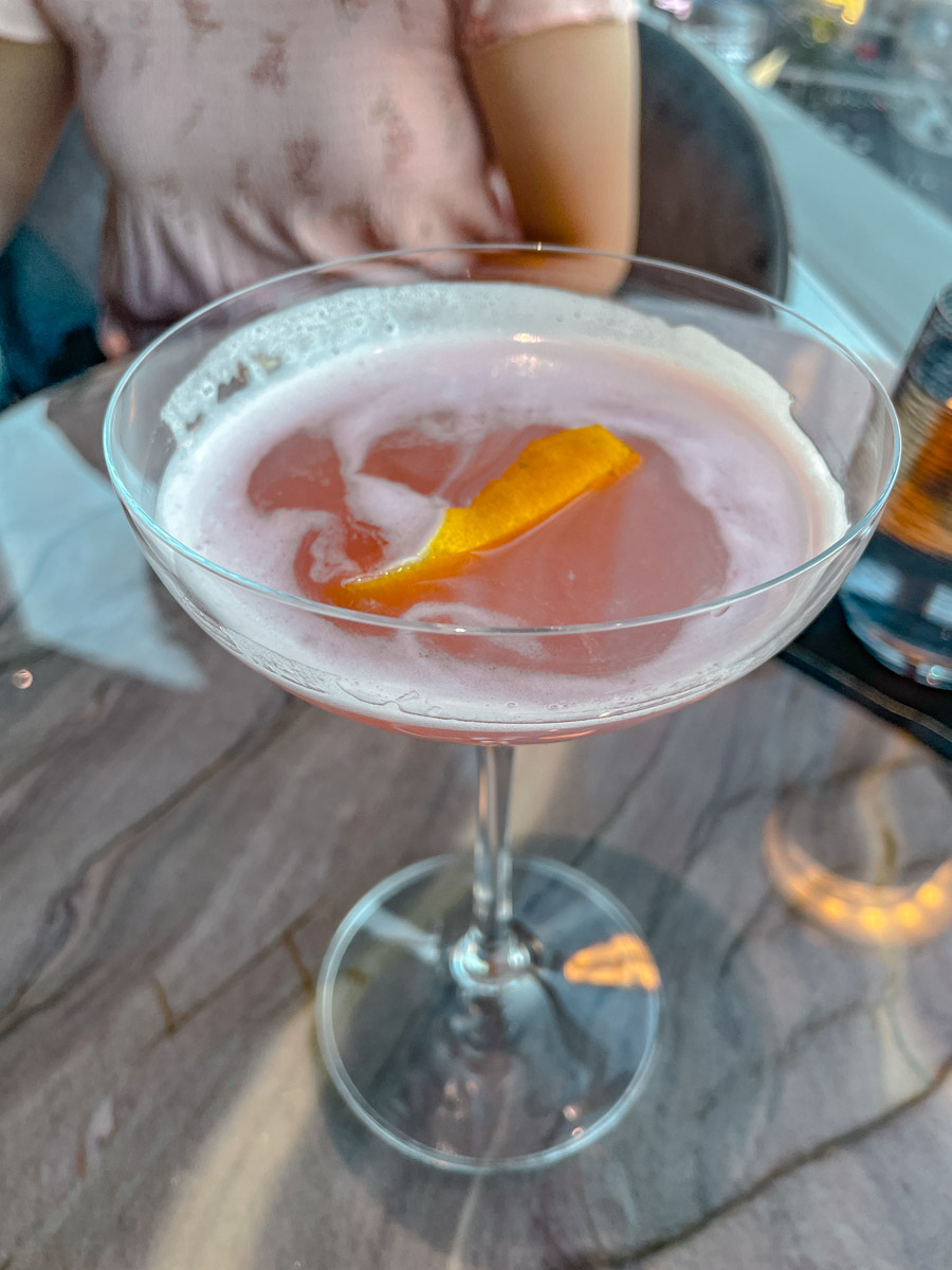 Pink cocktail in a glass.